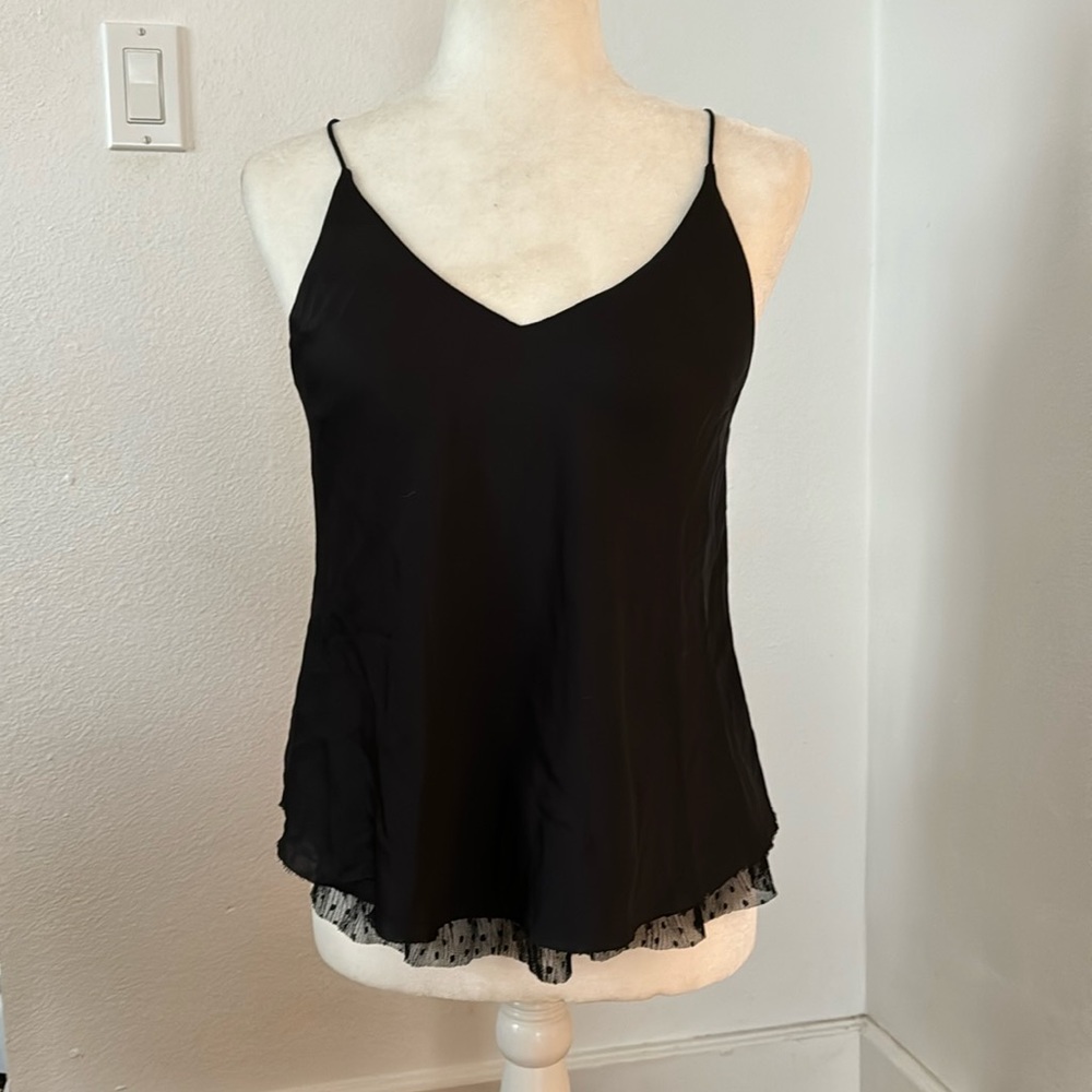 Beautiful, silky, camisole top with lace underlay. Free People size extra small.